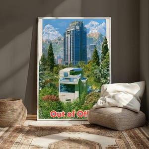 May include: A framed wall art print featuring a light-colored office photocopier situated in a lush green garden with trees and shrubs. In the background, a tall blue skyscraper rises against a blue sky with clouds. The text Out of Office is at the bottom.