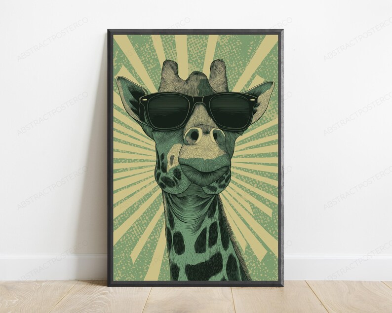 May include: A framed wall art print featuring a stylized illustration of a giraffe wearing black sunglasses. The giraffe has a green and black spotted pattern, set against a background of radiating light green and beige sunburst lines.
