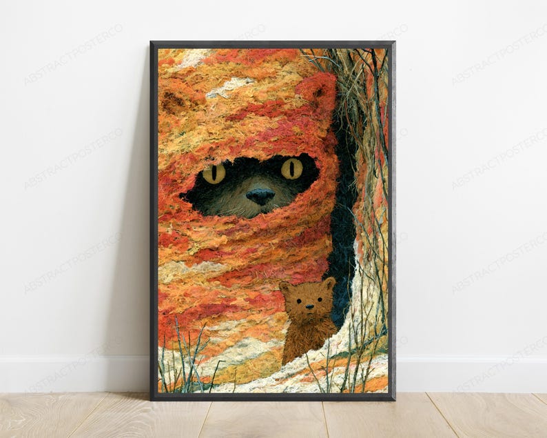 May include: A framed wall art print featuring a textured, orange and yellow abstract landscape with a dark, hidden creature peering out from a central opening. A small, brown, furry animal figure stands in the lower right foreground of the scene.