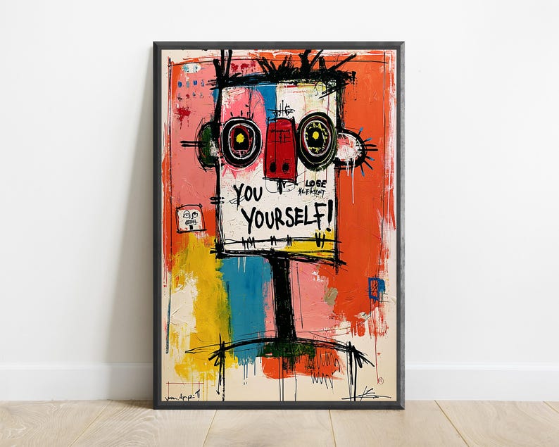 May include: A framed abstract expressionist print featuring a stylized face with large circular eyes and a red nose. The text YOU YOURSELF! is written in black ink. The background consists of vibrant orange, pink, yellow, and blue paint strokes.