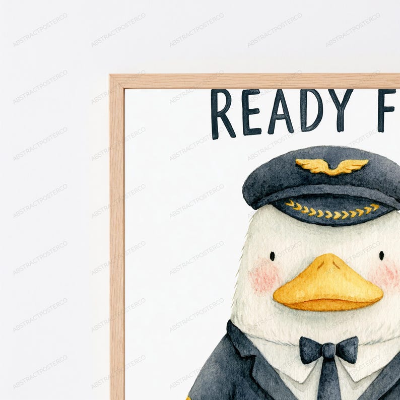 May include: A framed watercolor print featuring a white duck dressed as a pilot, wearing a dark blue captain's hat with gold wings and a black bowtie. The text READY F is visible at the top. The artwork is enclosed in a light wood frame.