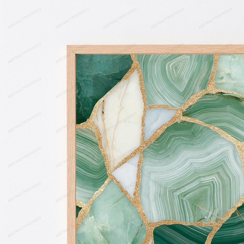 May include: A framed wall art piece featuring a mosaic pattern of green and white agate stone slices. The segments are separated by thin, textured gold lines that create a cracked, geode-like appearance within a light-colored wooden frame.