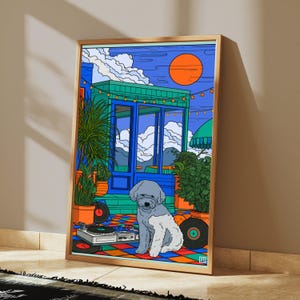 May include: A framed art print featuring a gray and white dog sitting on a colorful checkered floor. The scene includes a DJ turntable, vinyl records, potted plants, and a blue building structure under a bright orange sun and blue sky.