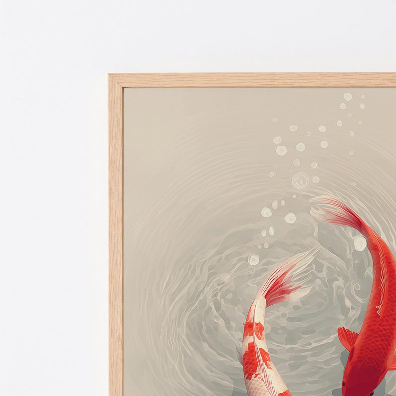 May include: A framed wall art print featuring two koi fish swimming in light gray water. One fish is solid orange-red, while the other is white with orange-red patches. Circular ripples and bubbles are visible on the water surface.