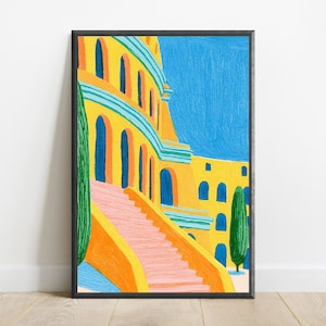 May include: A framed art print featuring a vibrant painting of a yellow building with arched windows and a pink staircase. The scene includes tall green cypress trees against a bright blue sky, rendered with visible brushstrokes and bold colours.