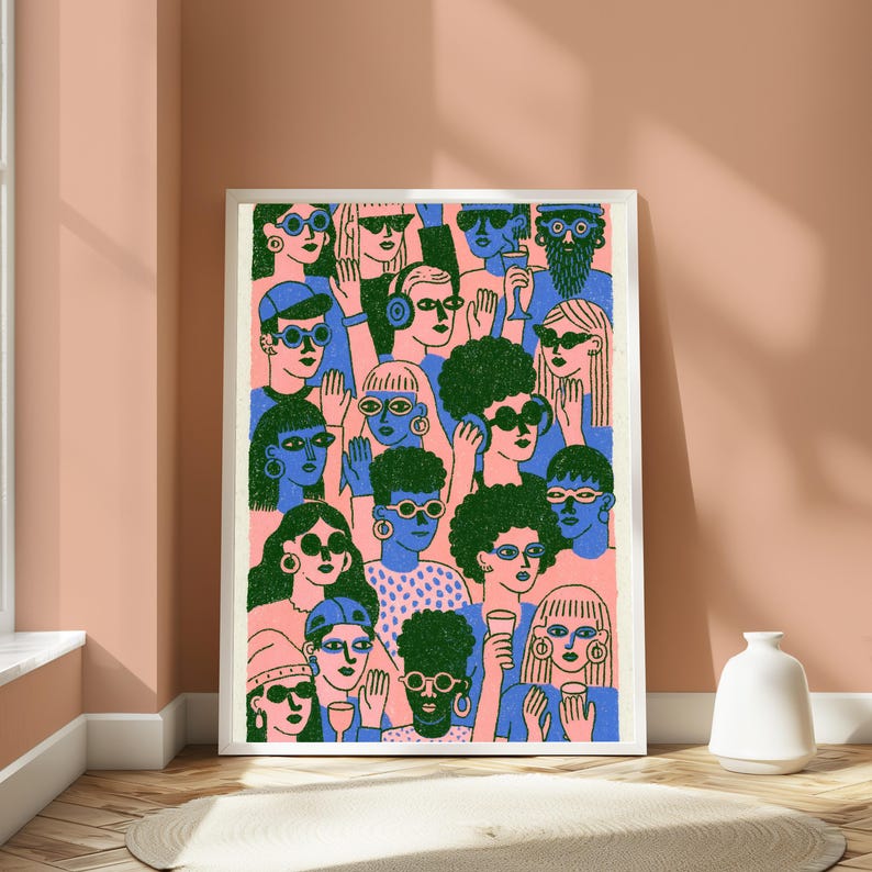 May include: A framed art print featuring a dense crowd of stylised figures in blue and green tones against a light pink background. The figures wear various glasses and accessories, with some holding drinks, rendered in a flat, graphic illustration style.