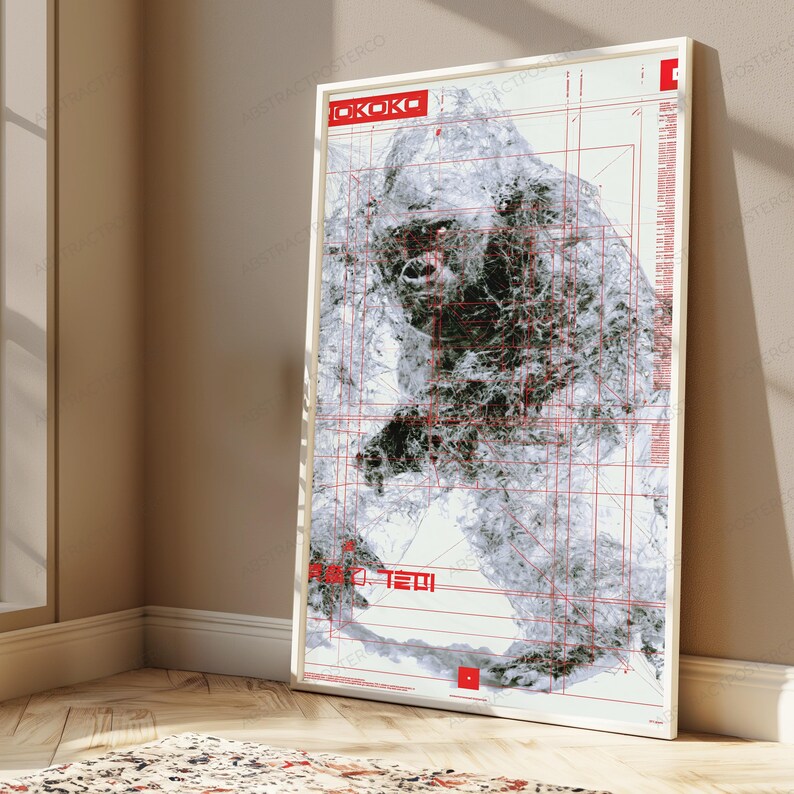 May include: A rectangular framed wall art print featuring a white background with a detailed, textured black and white illustration of a gorilla. The artwork is overlaid with thin red grid lines, geometric markings, and red text reading OKOKO.