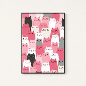 May include: A rectangular wall art print in a black frame featuring a dense, repeating pattern of illustrated cats in various shades of pink, white, gray, and black. Each cat has a simple, stylized face with small ears, eyes, and whiskers.