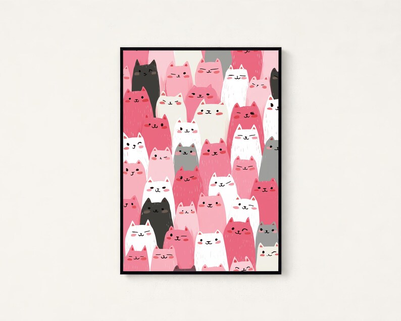 May include: A rectangular wall art print in a black frame featuring a dense, repeating pattern of illustrated cats in various shades of pink, white, gray, and black. Each cat has a simple, stylized face with small ears, eyes, and whiskers.