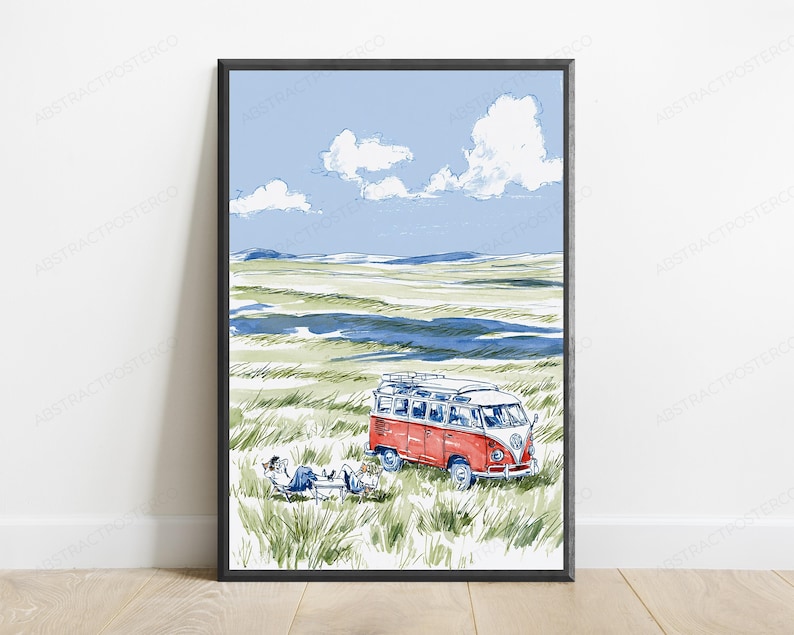 May include: A framed art print featuring a watercolor illustration of a red and white vintage camper van parked in a grassy field. Two figures are relaxing in chairs next to the vehicle under a light blue sky with white clouds and distant hills.