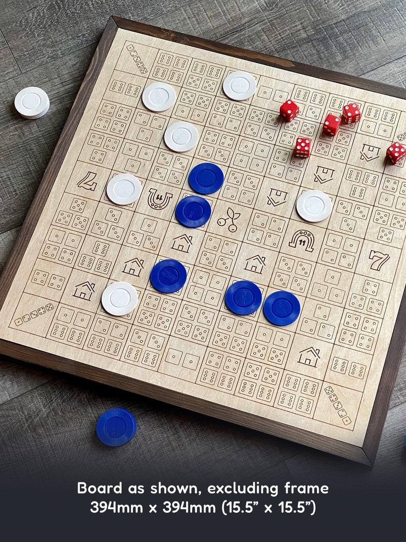 May include: Wooden board game with a dark brown frame, featuring a grid of squares with etched symbols and dice patterns. Includes red dice, white and blue game chips. The board measures 15.5 x 15.5 inches.