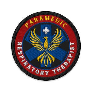 Puede incluir: Parche bordado negro y rojo con una estrella de la vida azul y blanca y un fénix amarillo. El texto dice "Paramédico Respiratorio".