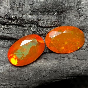 AAA Orange Opal Pair: Faceted Oval Ethiopian Opal (10x7/6x9 MM)