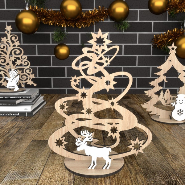 3 fichiers différents découpés au laser, des arbres de Noël avec des cadeaux de cerfs et de bonshommes de neige, des fichiers découpés au laser en téléchargement numérique SVG Dxf Pdf Cdr Ai