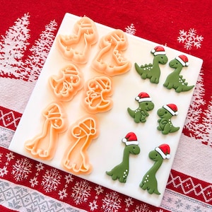 Juldinosaurielerutstickare – Tomtehatt Dino Polymer Clay Örhänge Verktyg – T-Rex, Bronto, Stego (Flera Storlekar)