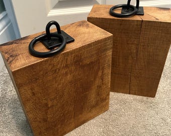 Pair of chunky heavy oak doorstops with free postage