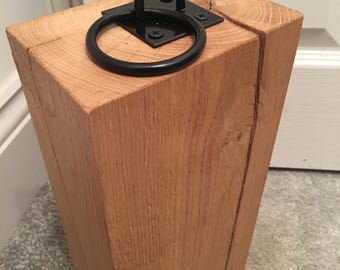 Tall chunky and smart doorstop in French Oak with free postage