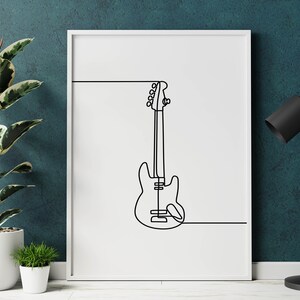 May include: A white framed print with a black line drawing of an electric guitar on a white background.