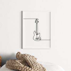 May include: A black and white line drawing of a bass guitar in a white frame.