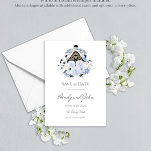 May include: A 13x18 cm Save the Date invitation card featuring a watercolour illustration of a cruise ship with a Mickey Mouse icon, surrounded by blue and white flowers. The text reads: SAVE the DATE FOR THE WEDDING OF Ainsly and John MARCH 20, 2026 The Disney Wish formal invitation to follow.