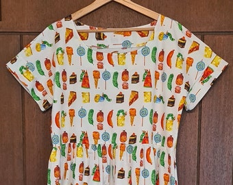 Made in Aust. Womens dress the very hungry caterpillar food dress made from a beautiful soft cotton fabric. Colourful and relaxed fit dress