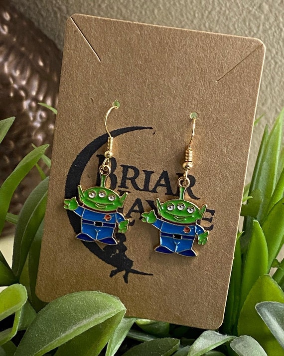 Green alien hotsell earrings