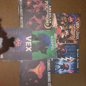 May include: A collection of album covers featuring vibrant, surreal artwork. The covers display titles like "American Psychopomp," "Vex & Jinx," and "Fungus Among Us." The color palette includes shades of red, purple, green, and black, with illustrations of fantastical characters.