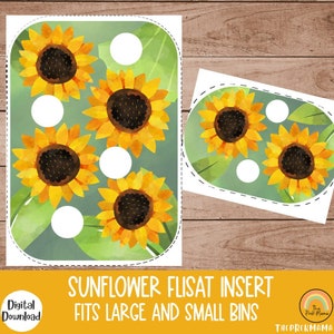 May include: Printable sunflower-themed insert for a large or small Fliseat bin. The insert features five sunflowers with yellow petals and brown centers on a green background. The text "SUNFLOWER FLISAT INSERT FITS LARGE AND SMALL BINS" is printed below the image.