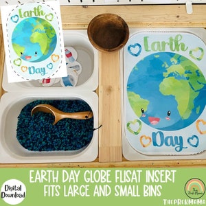 May include: A white plastic bin with a blue and green sensory bin inside. A wooden spoon is on top of the blue and green sensory bin. A white plastic bin with a blue and green globe insert with the words "Earth Day" and a smiling face. A white plastic bin with a variety of small plastic items inside. A wooden bowl is on top of the bins.