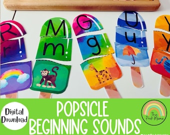 May include: A set of colorful popsicle-shaped cards with letters and pictures. The cards are designed to help children learn beginning sounds. The cards are labeled "Popsicle Beginning Sounds".