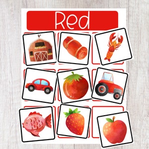 May include: Red color matching game with images of a barn, a red roll, a lobster, a car, a tomato, a tractor, a fish, a strawberry, and an apple.