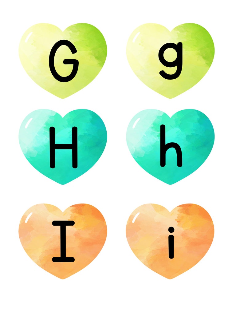 May include: Six watercolor hearts with letters G, g, H, h, I, and i. The hearts are in shades of green, blue, and orange.
