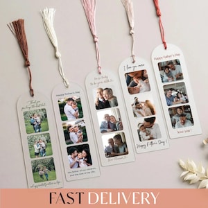 a collection of five white tassel bookmarks, each with a photo of a family, arranged on a light-colored surface. The bookmarks are designed to be used as reading aids, with each page featuring a different family photo. The bookmarks are accompanied by a small branch of white flowers, adding a touch of natural beauty to the scene.