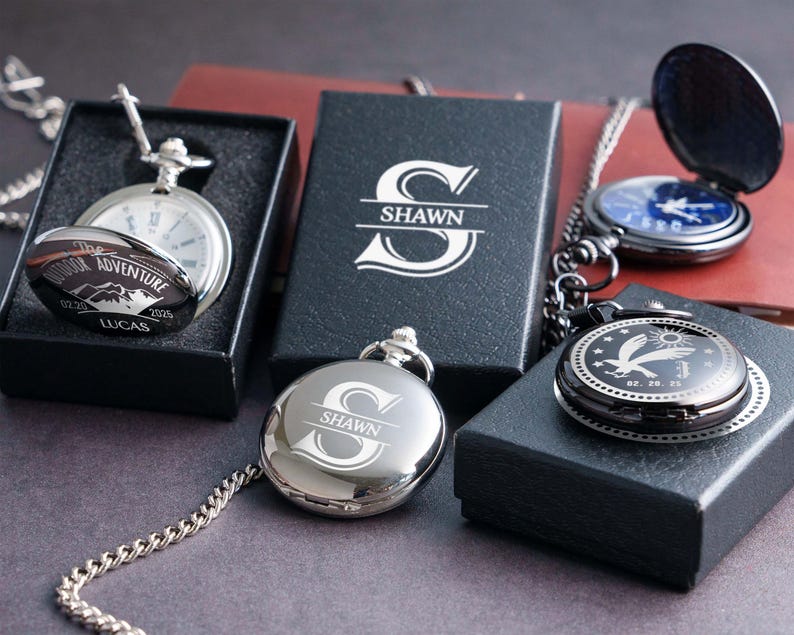 a collection of pendants and boxes with the name "Shawn" engraved on them.