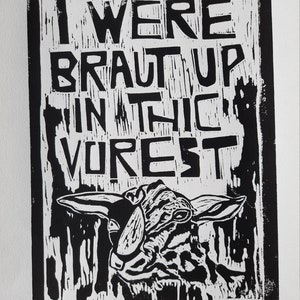 May include: Black and white linocut print of a sheep with the text "I were braut up in thic vurest" and the number "51/25" and the artist's signature "Rwearing 2020".