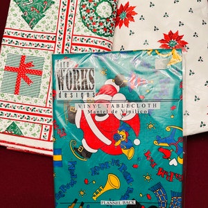 May include: Christmas-themed tablecloths in various designs. One is a teal vinyl tablecloth with Santa Claus and musical notes. The others feature festive patterns like Christmas trees, wreaths, and poinsettias. The teal tablecloth is 52" x 70" oblong.