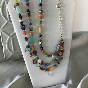 Multi Color Necklace.  Multi Semi Precious Stones.  Three Strand Graduated Lengths.