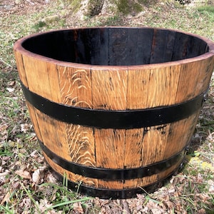 Wooden oak garden pot from a wine barrel