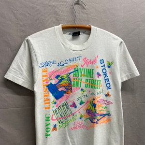 Small / 1990s Skateboarding Skate or Die White Cartoon T Shirt USA Made