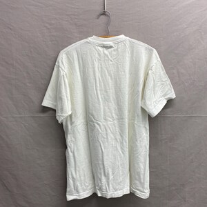 May include: A white t-shirt with a crew neck and short sleeves.