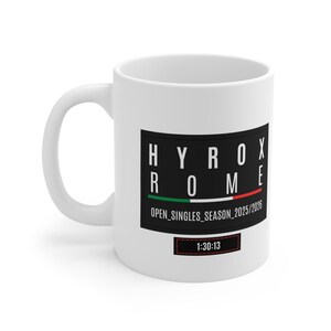 May include: White ceramic mug with a black rectangular graphic. The graphic reads "HYROX ROME" with the Italian flag colors and "OPEN_SINGLES_SEASON_2025/2026" and "1:30:13" in white text.