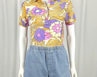 Vintage 1970’s ‘Enrico’ Sheer Floral Print V-Neck Short Sleeved Collared Tee Shirt • Pink • Purple • Gold • Button Detail • Fitted • XS