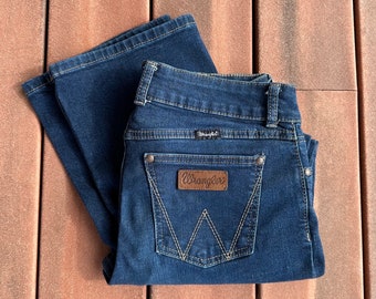 Vintage Wrangler Boot Cut Semi Flared Leg Blue Jeans in Solid Dark Wash • Super Low Rise • Denim • Thick Stitching • Size 29 x 30 • Medium