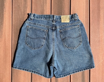 Vintage 1990’s Lee Denim Blue Jean Shorts • High Rise • Mom Jeans • Mid Thigh Length • Zipper Front • Leather • Medium Blue Wash • Small
