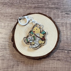 Delivery Dragonite and Rowlet - Cute Clear Acrylic Keychain | Anime Inspired