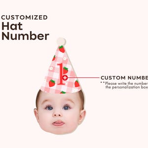 May include: A cone-shaped party hat featuring a pink and white gingham pattern with red strawberry illustrations and a white pom-pom on top. The hat displays the number 1 in red. Text reads: CUSTOMIZED Hat Number, CUSTOM NUMBER, Please write the number.