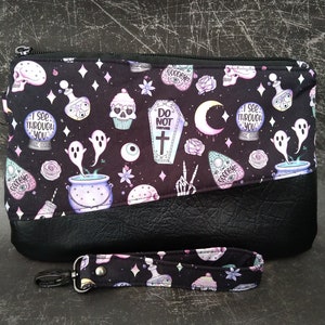 Wristlet clutch, spooky witchy, bag, goth pastel Goth, skulls crystal ball eyes
