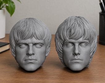 Sculpture de tête de Liam et Noel Gallagher, groupe Oasis
