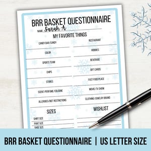 May include: A white BRR Basket Questionnaire with a light blue border and snowflake accents. The questionnaire includes prompts for favorite things and sizes. A black pen rests on the paper, ready for use.