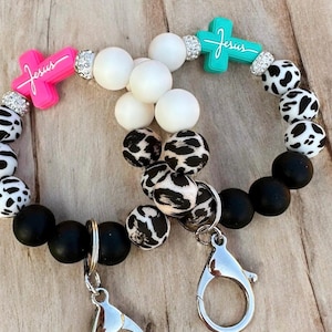 Wristlet Keychain cheetah with Jesus charm